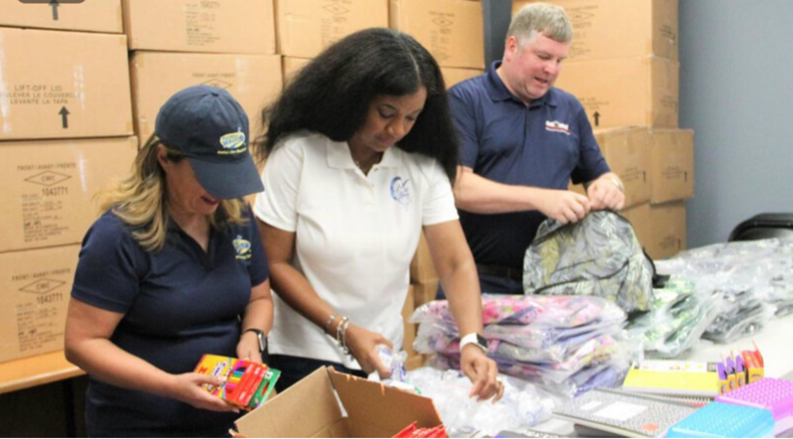 Volunteers packing supplies